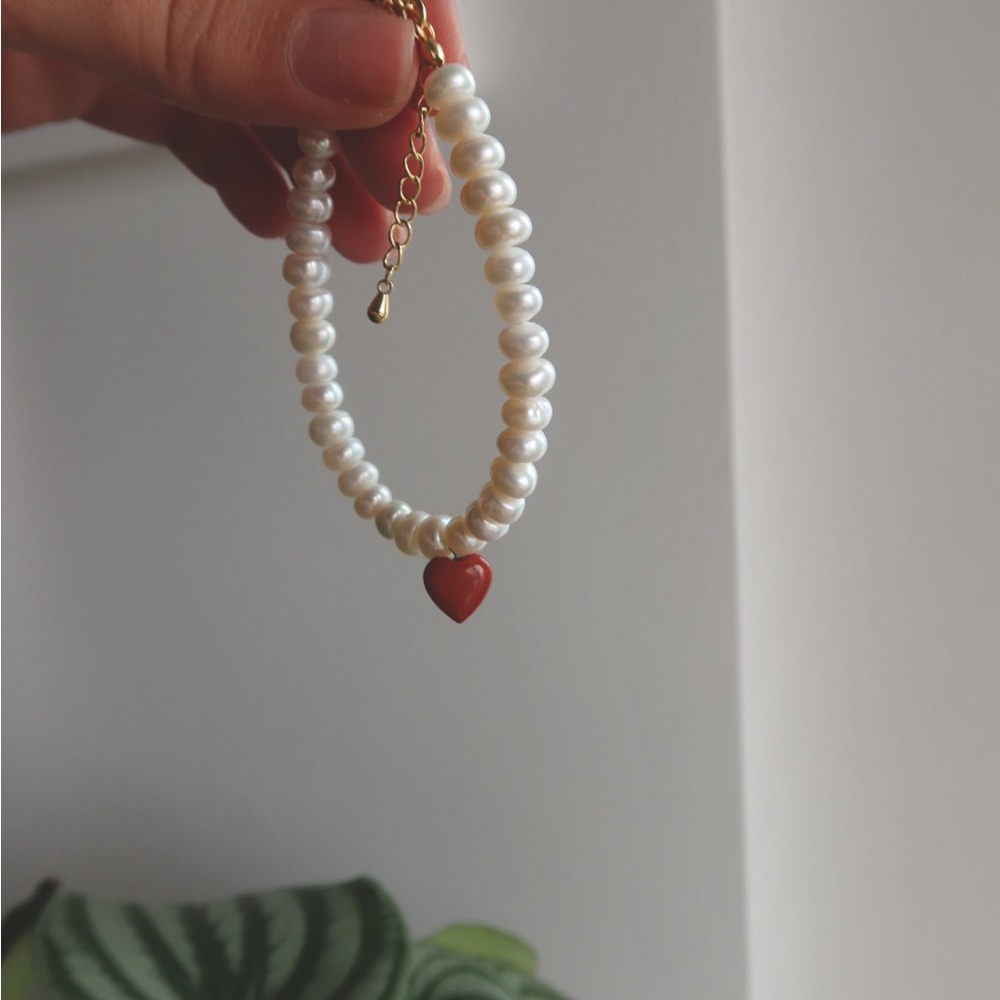 Freshwater pearl bracelet with red jade heart pendant